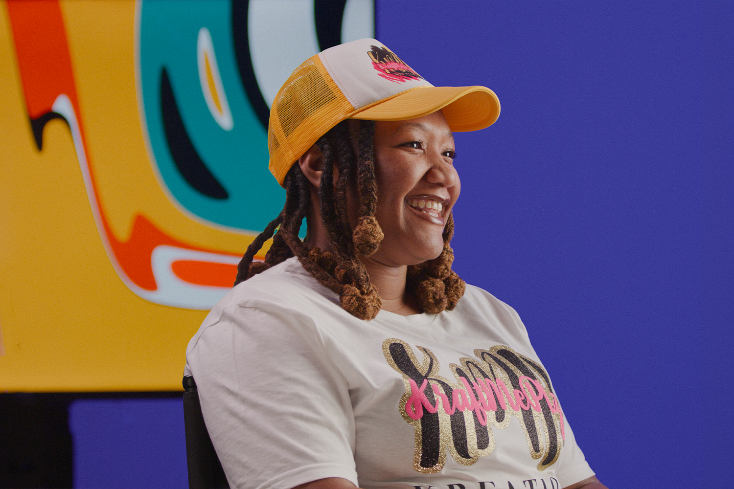 Entrepreneur smiling during the filming of testimonials for MAM's Innova business training program.