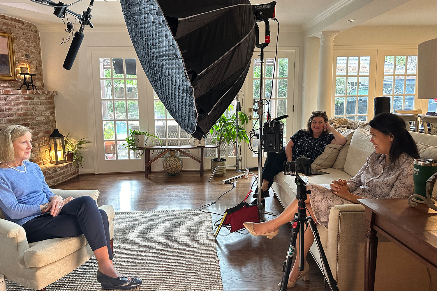 The LV Branding team filming documentary interviews with soft lighting and cameras for the annual gala.
